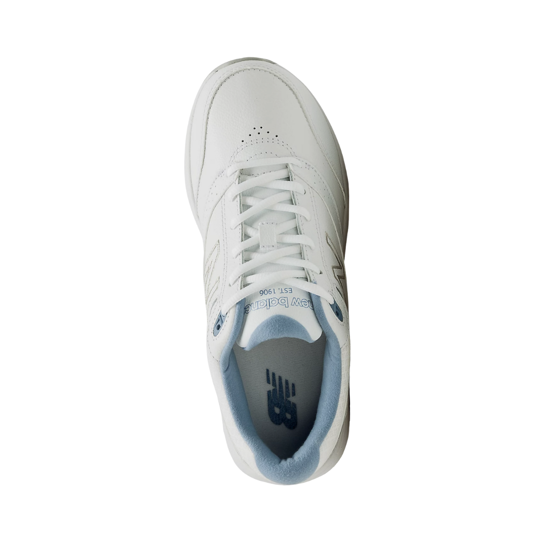 Top View of Women’s New Balance 928v3 walking shoe in white with blue – featuring a padded tongue and collar, wide lacing system for a secure fit, and cushioned insole designed to support foot stability and reduce fatigue.