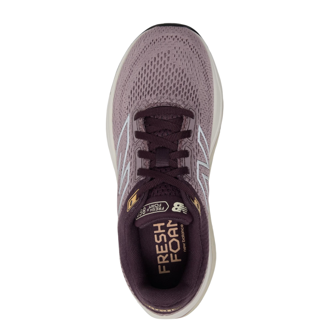 Top view of Women’s New Balance Fresh Foam X 860v14 in Ice Wine/Plum Brown/Silver Metallic – featuring a breathable engineered mesh upper, traditional lace-up closure, and padded tongue for enhanced comfort.