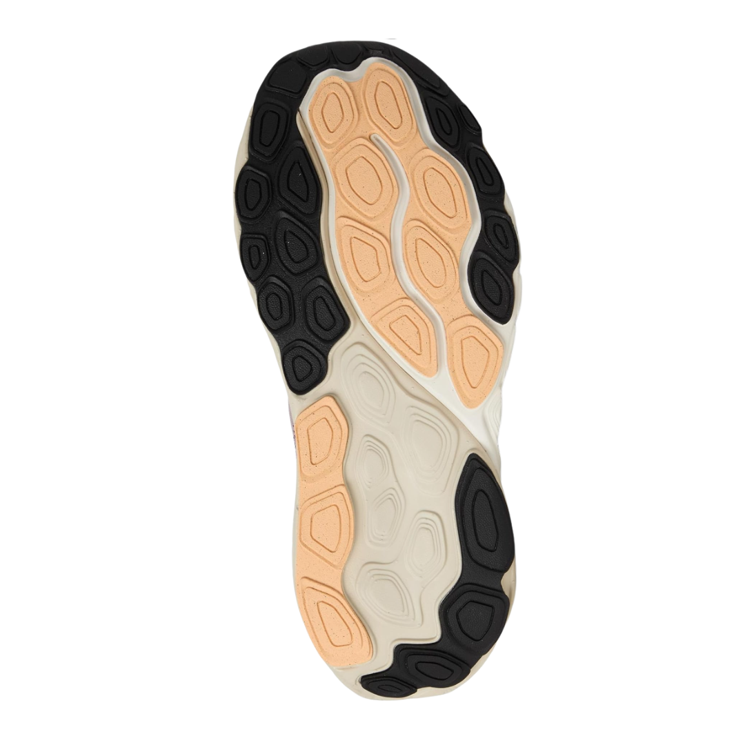 Bottom view of Women’s New Balance Fresh Foam X 860v14 in Ice Wine/Plum Brown/Silver Metallic – featuring a durable rubber outsole with strategic tread patterns for reliable traction on various surfaces.