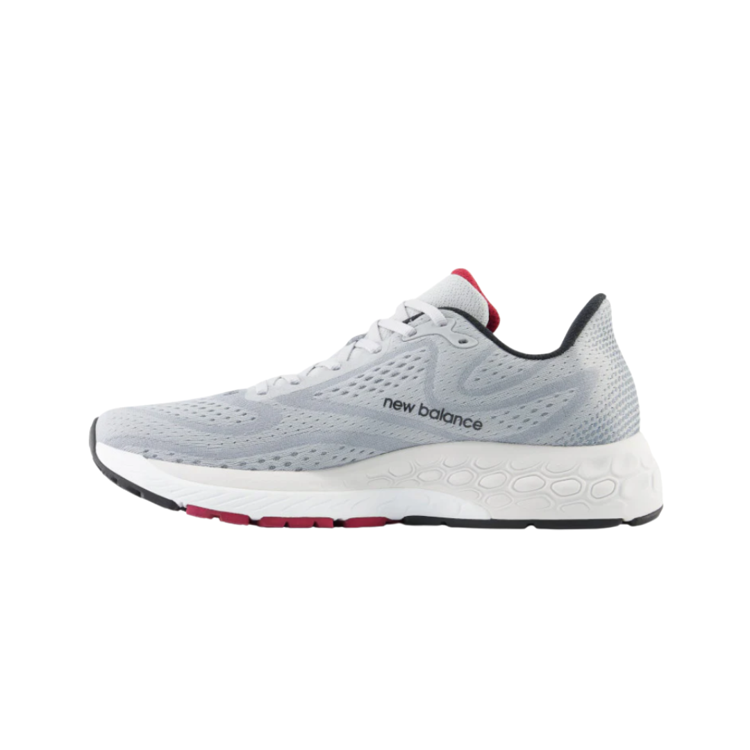 Side View of Men’s New Balance Fresh Foam X 880v13 running shoe in aluminum grey with crimson red – featuring engineered mesh upper for breathability, Fresh Foam X midsole for premium cushioning, and sleek design with bold color accents.