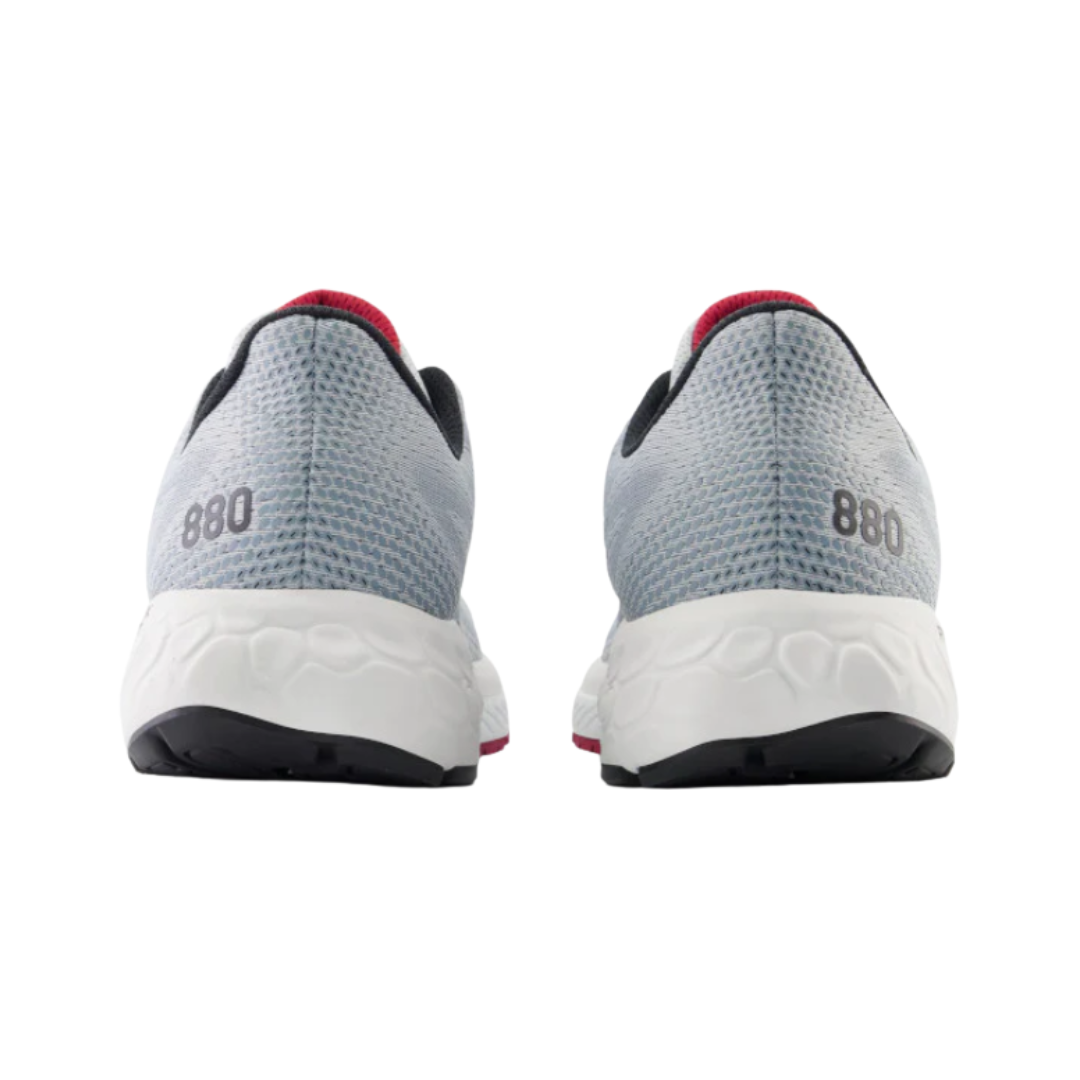 Back View of Men’s New Balance Fresh Foam X 880v13 running shoe in aluminum grey with crimson red – featuring contoured heel support, pull tab for easy entry, and reflective accents for enhanced visibility.