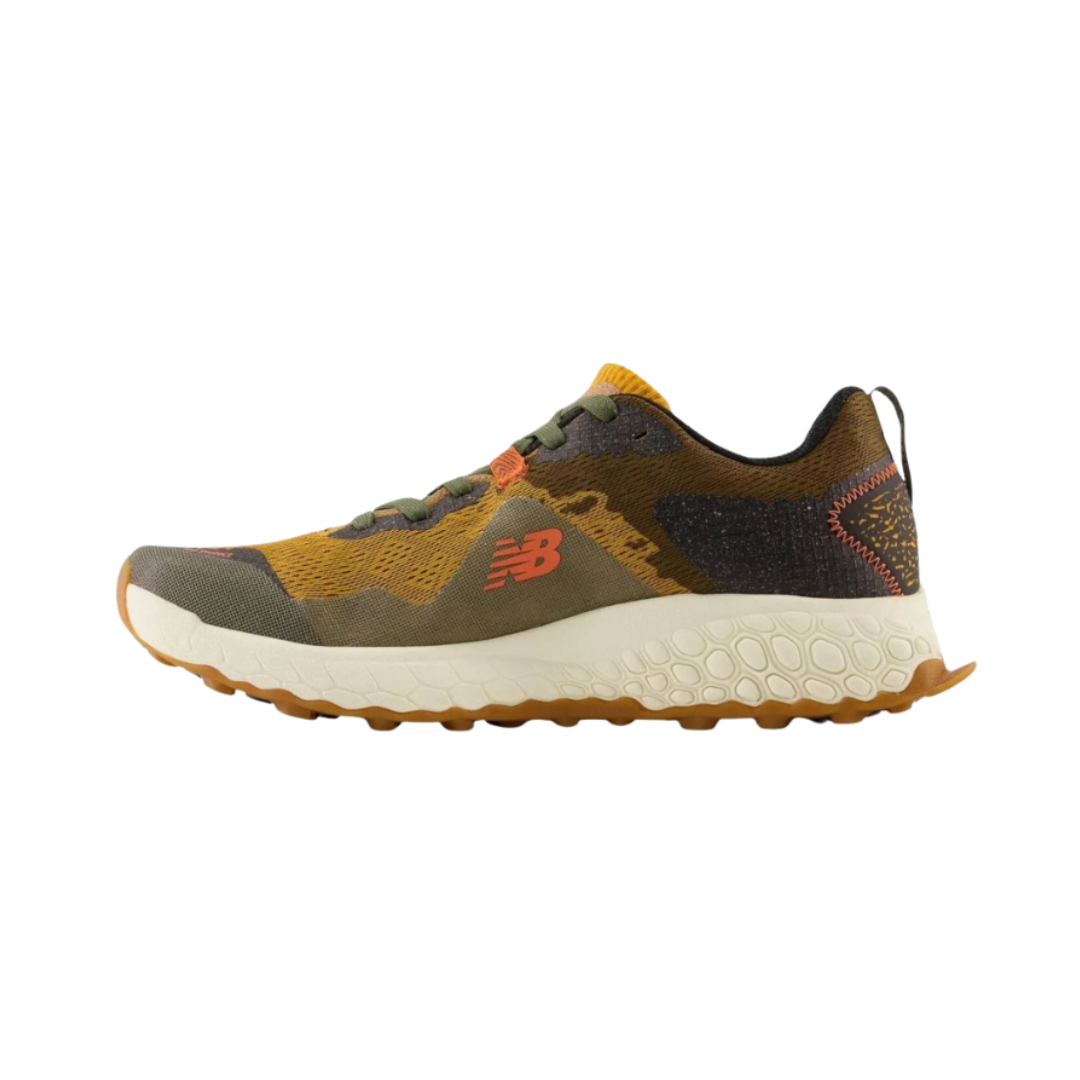 Side View of Men’s New Balance Fresh Foam X Hierro v7 trail running shoe in golden hour with dark camo and black – featuring engineered mesh upper with camo print, Fresh Foam X midsole cushioning for plush comfort, and Vibram® outsole for superior traction on rugged trails.