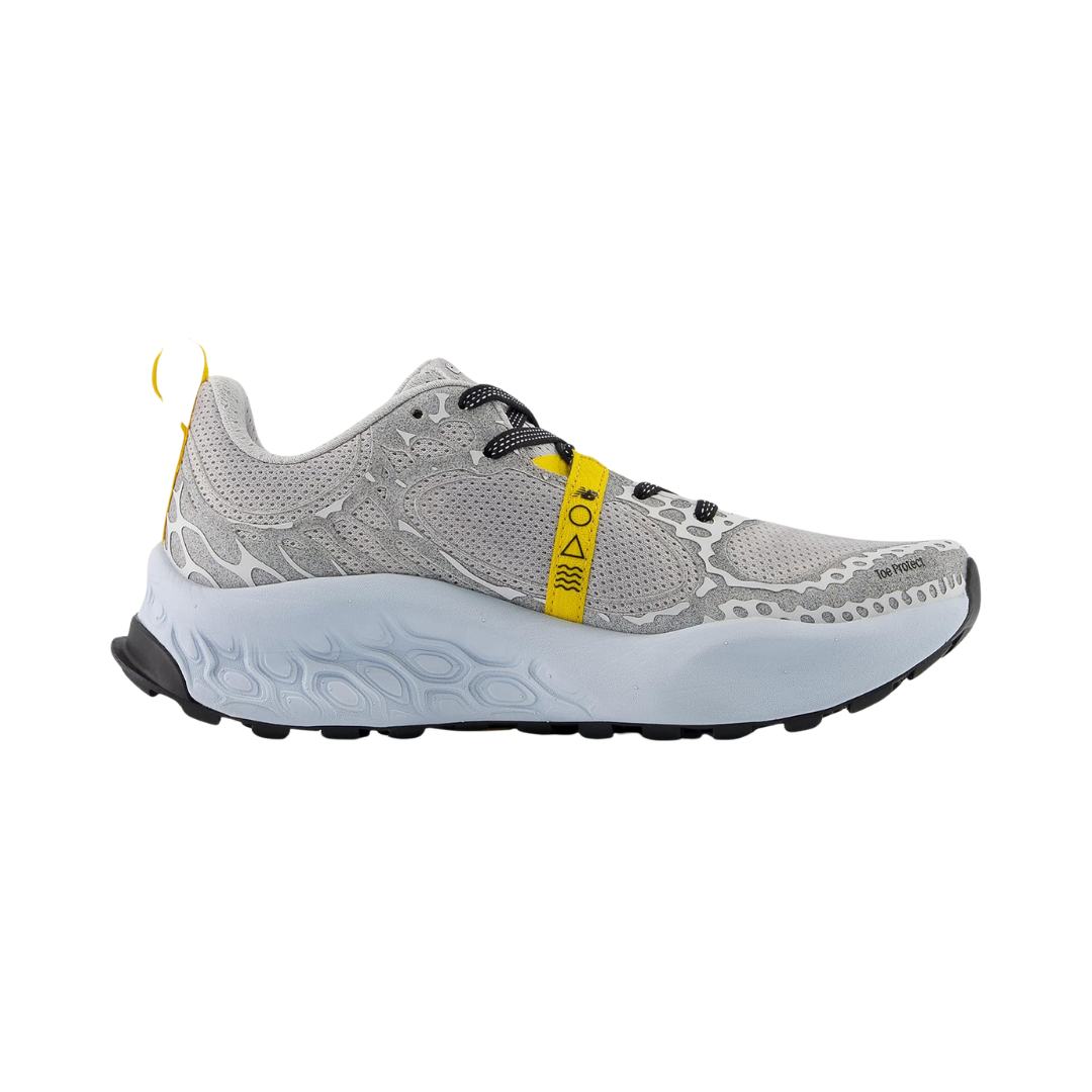 Side view of Women’s New Balance Fresh Foam X Hierro v8 in Grey Matter/Quarry Blue/Copper – featuring a Fresh Foam X midsole for plush cushioning, Vibram® EcoStep Natural outsole for superior traction, and sleek design lines for a modern aesthetic.