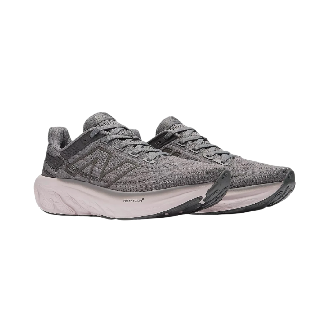 Side View of Women’s New Balance Fresh Foam X 1080v13 running shoe in castlerock with December sky – featuring a breathable, flexible knit upper for adaptive fit, ultra-cushioned Fresh Foam X midsole for impact absorption, and a streamlined lace system that provides secure, pressure-free support.