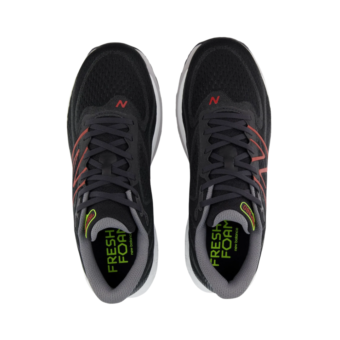 Top View of Men’s New Balance Fresh Foam X 880v13 running shoe in black with brick red – featuring soft padded tongue and collar, secure lace-up design, and Fresh Foam X cushioning underfoot for pressure relief and support.