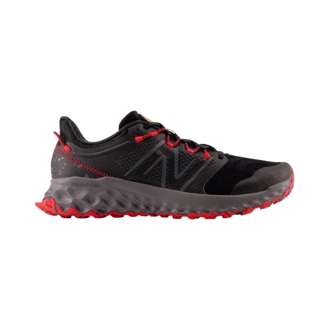Side view of Men's New Balance Fresh Foam x Garoe v1 athletic shoe in magnet, true red, and black – featuring cushioned Fresh Foam midsole, breathable mesh upper, and durable rubber outsole for traction.