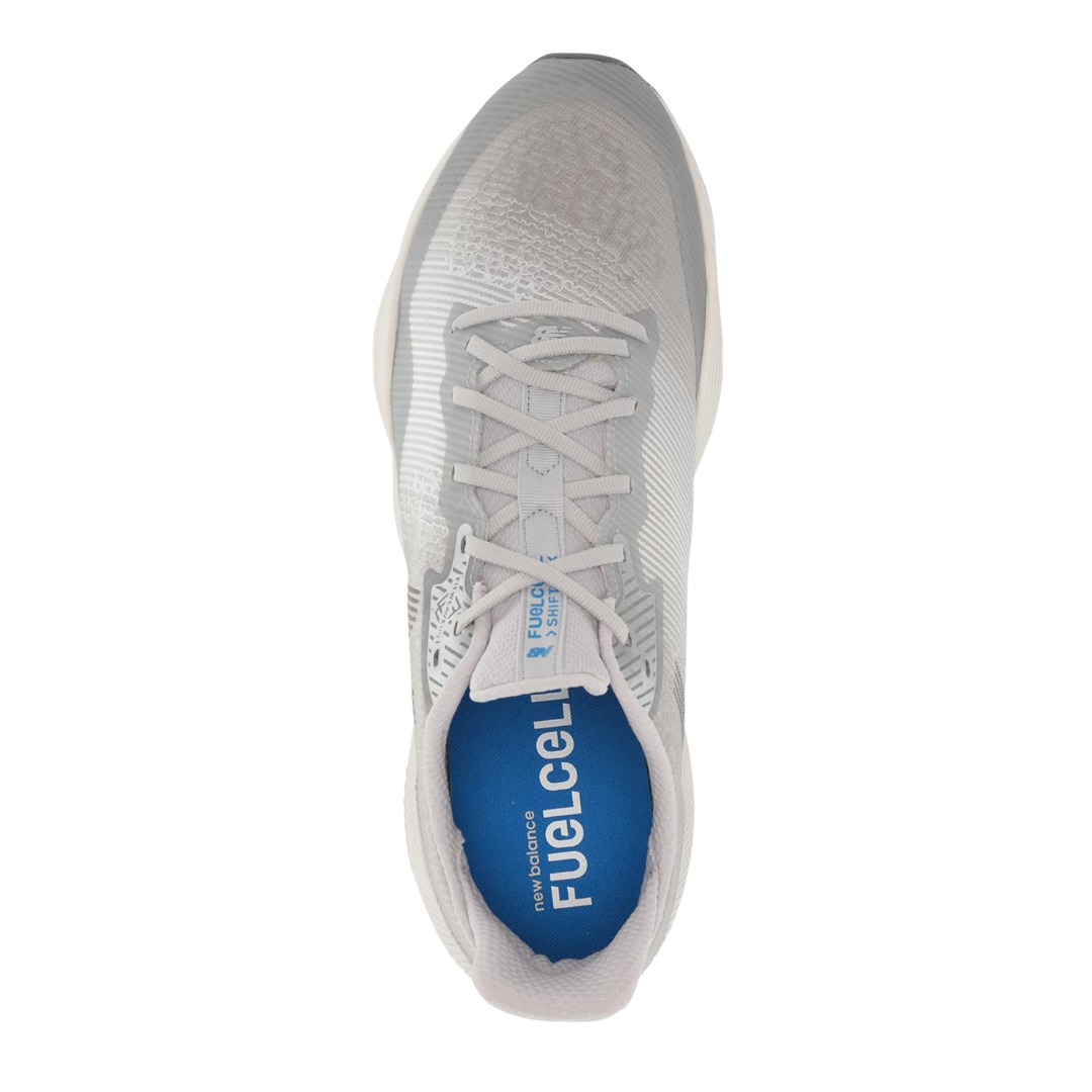 Top View of Men’s New Balance FuelCell Shift TR training shoe in steel with white and serene blue – featuring responsive FuelCell midsole cushioning, supportive synthetic overlays, and breathable mesh panels.