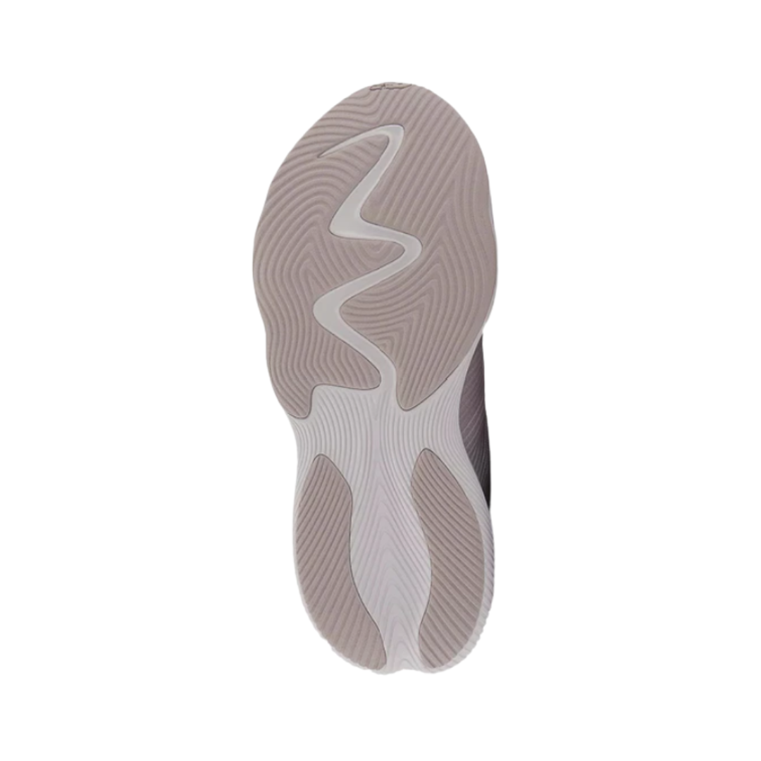Bottom view of Women’s New Balance FuelCell Shift TR athletic shoe in logwood — highlighting rugged rubber outsole with multi-directional lugs designed for enhanced traction on varied terrains.