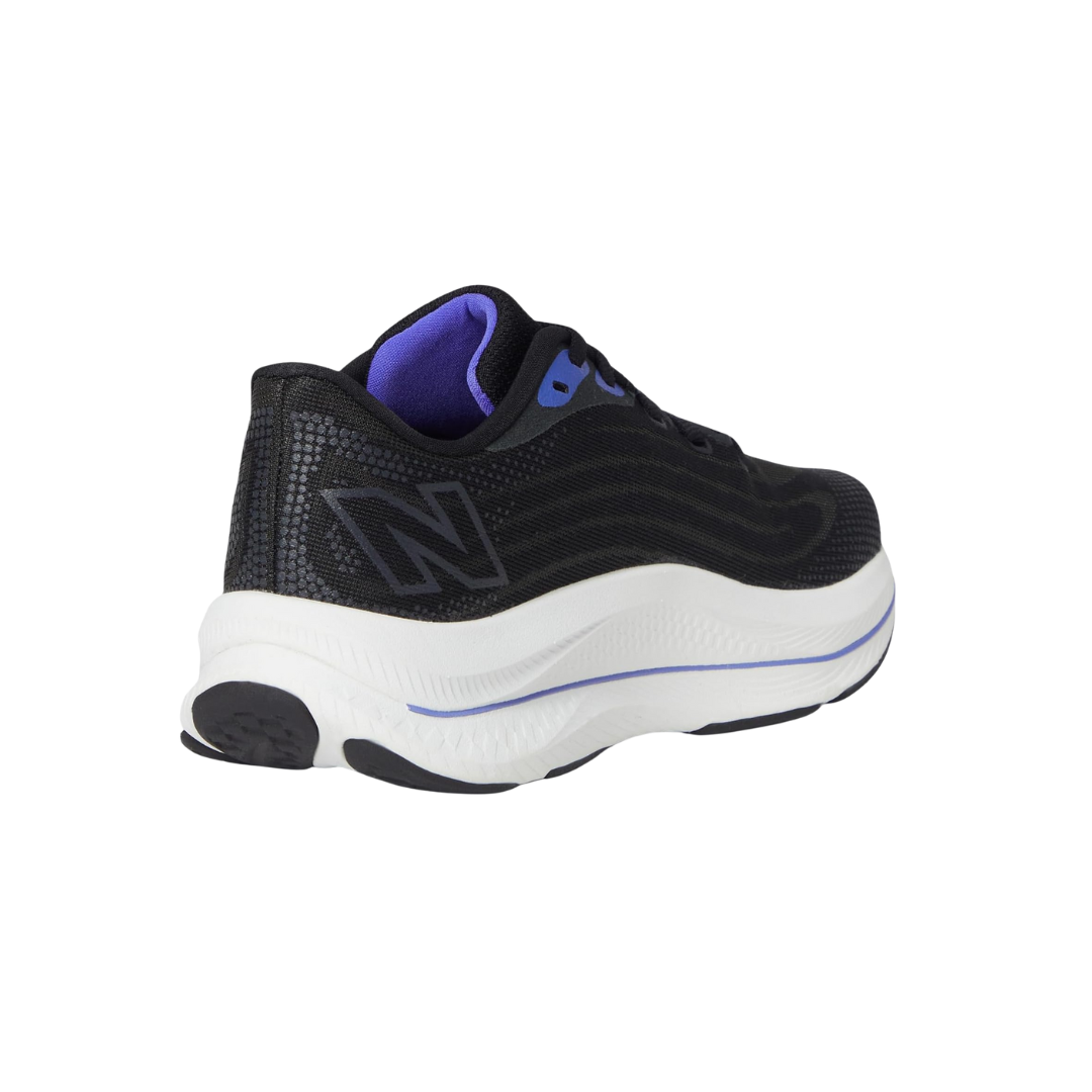 Back view of Women’s New Balance FuelCell Walker Elite in Black/Electric Indigo/Grey Violet – featuring a padded collar, heel pull tab for easy on/off, and reinforced heel counter for stability.