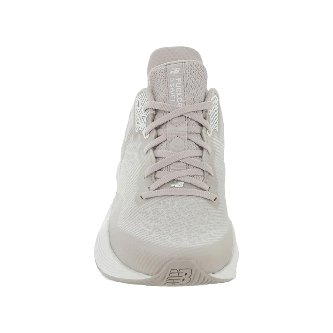 Front View of Women’s New Balance FuelCell Shift TR training shoe in logwood – featuring engineered mesh upper for breathability, FuelCell midsole for high-energy return, and lightweight design for agility.