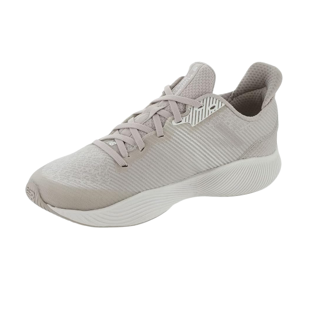 Side View of Women’s New Balance FuelCell Shift TR training shoe in logwood – featuring engineered mesh upper for breathability, FuelCell midsole for high-energy return, and lightweight design for agility.