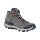 Side view of men’s Oboz Bridger Mid Waterproof hiking boot in Raven black/gray with nubuck leather upper, B-DRY waterproof protection, supportive mid-cut design, and rugged granite peak-inspired outsole.