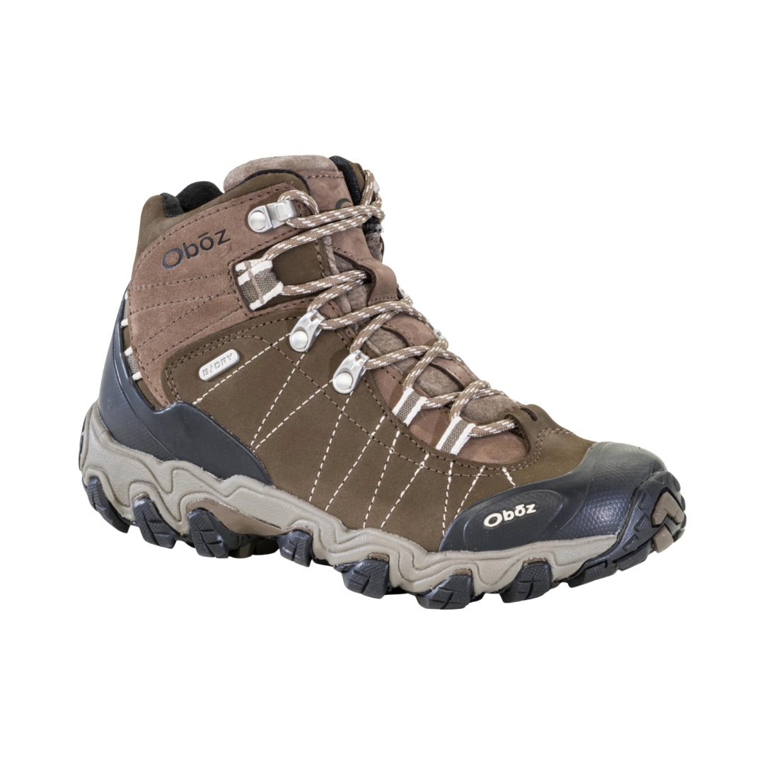 Side view of women’s Oboz Bridger Mid Waterproof hiking boot in Walnut brown with nubuck leather upper, waterproof membrane, mid-cut ankle support, and durable all-terrain outsole.
