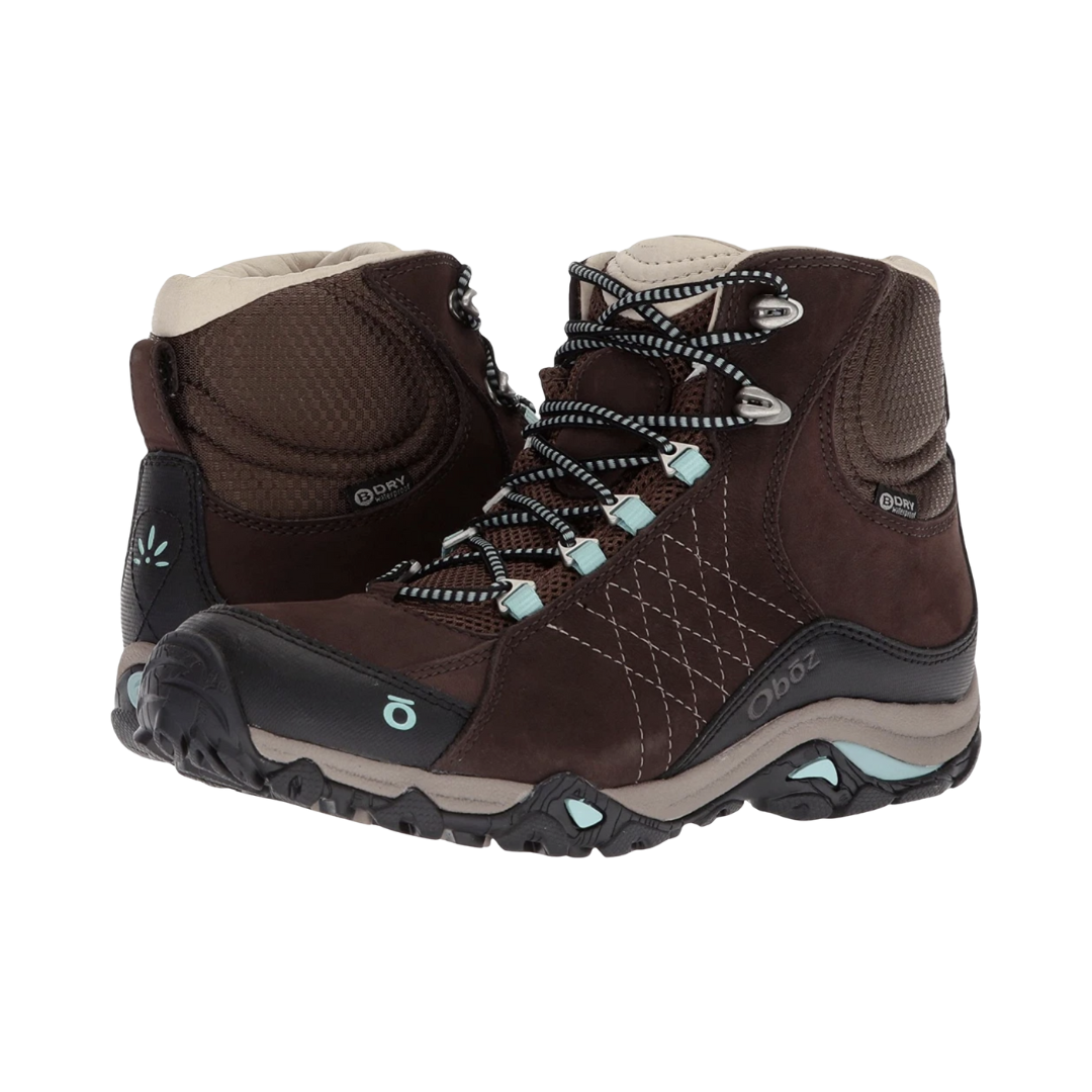 Side view of women’s Oboz Sapphire Mid Waterproof hiking boot in Java brown with contrasting trim, lightweight supportive mid-cut design, waterproof protection, and flexible trail outsole.