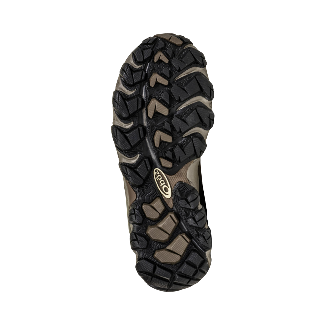 Bottom View of Women’s Oboz Bridger Mid Waterproof Hiking Boot in Walnut – featuring a rugged Granite Peak outsole with deep multi-directional lugs, durable rubber for excellent traction, and a supportive midfoot shank for stability on uneven terrain.