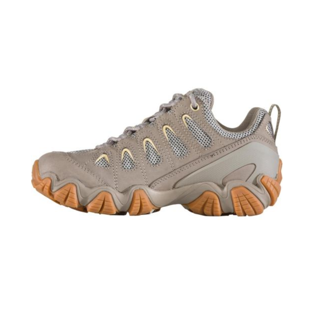Side view of Women's Sawtooth II Low hiking shoe in Sage Grey – featuring durable nubuck leather and breathable mesh upper, cushioned midsole, and rugged outsole designed for stable trail performance.