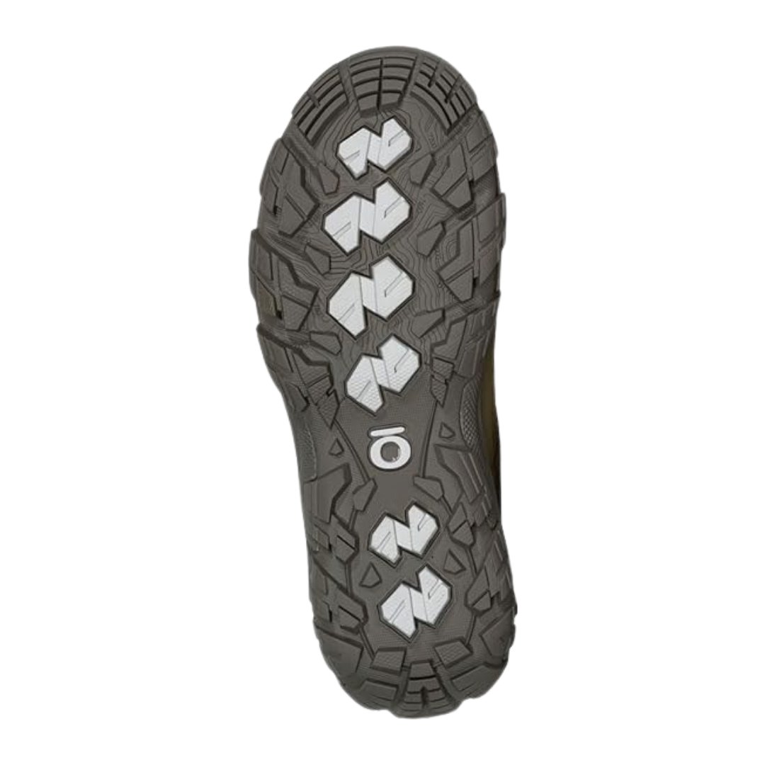 Bottom view of Women's Oboz Sawtooth X Low WP hiking shoe in Acorn – featuring a rugged outsole with aggressive multi-directional lugs, optimized for traction and stability on varied terrains.
