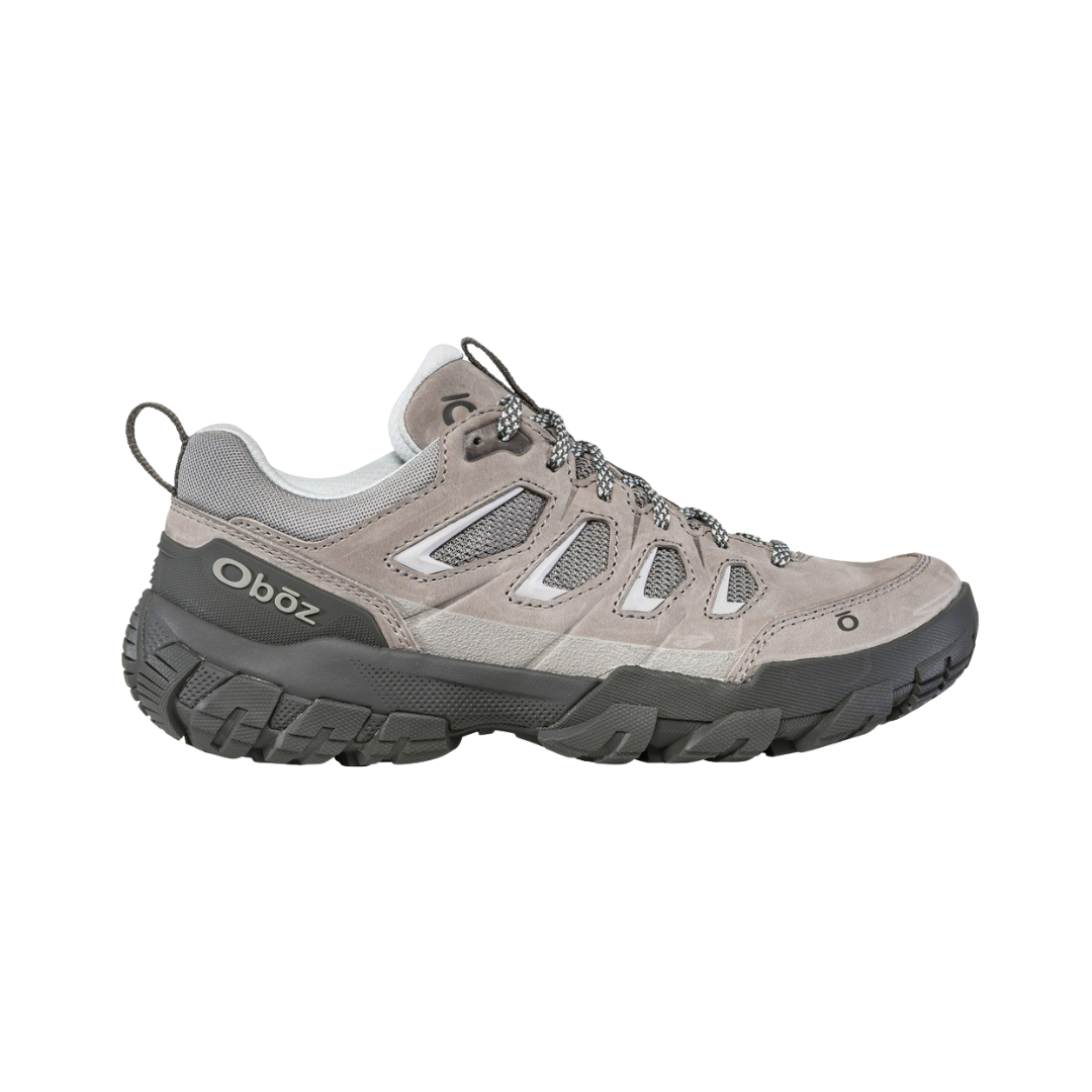 Side View of Women’s Oboz Sawtooth X Low Hiking Shoe in Drizzle – featuring a low-cut hiking silhouette for ankle mobility, EVA midsole with adaptive cushioning for shock absorption, and a reinforced heel and toe for added trail protection.