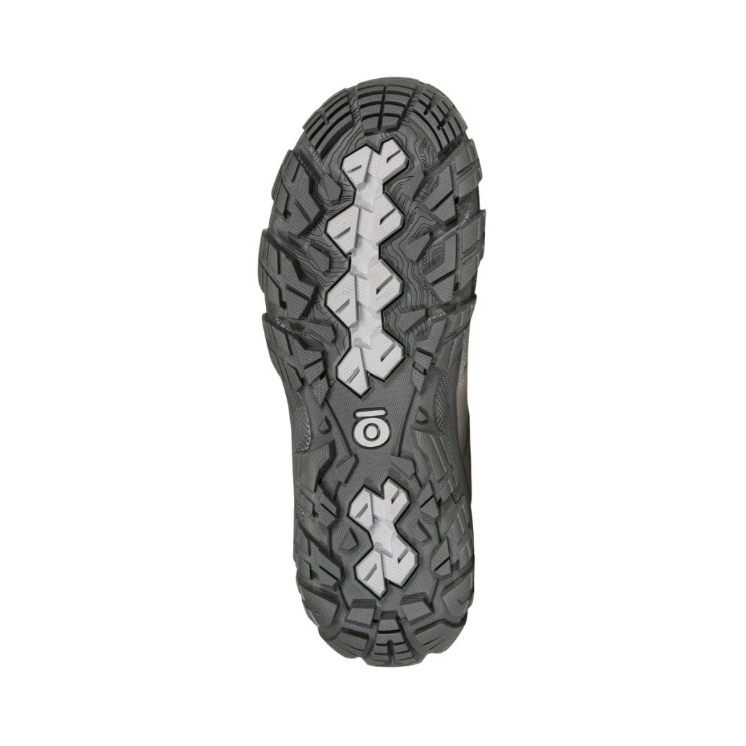 Bottom View of Women’s Oboz Sawtooth X Low Hiking Shoe in Drizzle – featuring a rugged Trail Tread outsole for superior multi-directional traction, durable rubber compound for long-lasting wear, and sawtooth-shaped lugs designed for stability on uneven terrain.