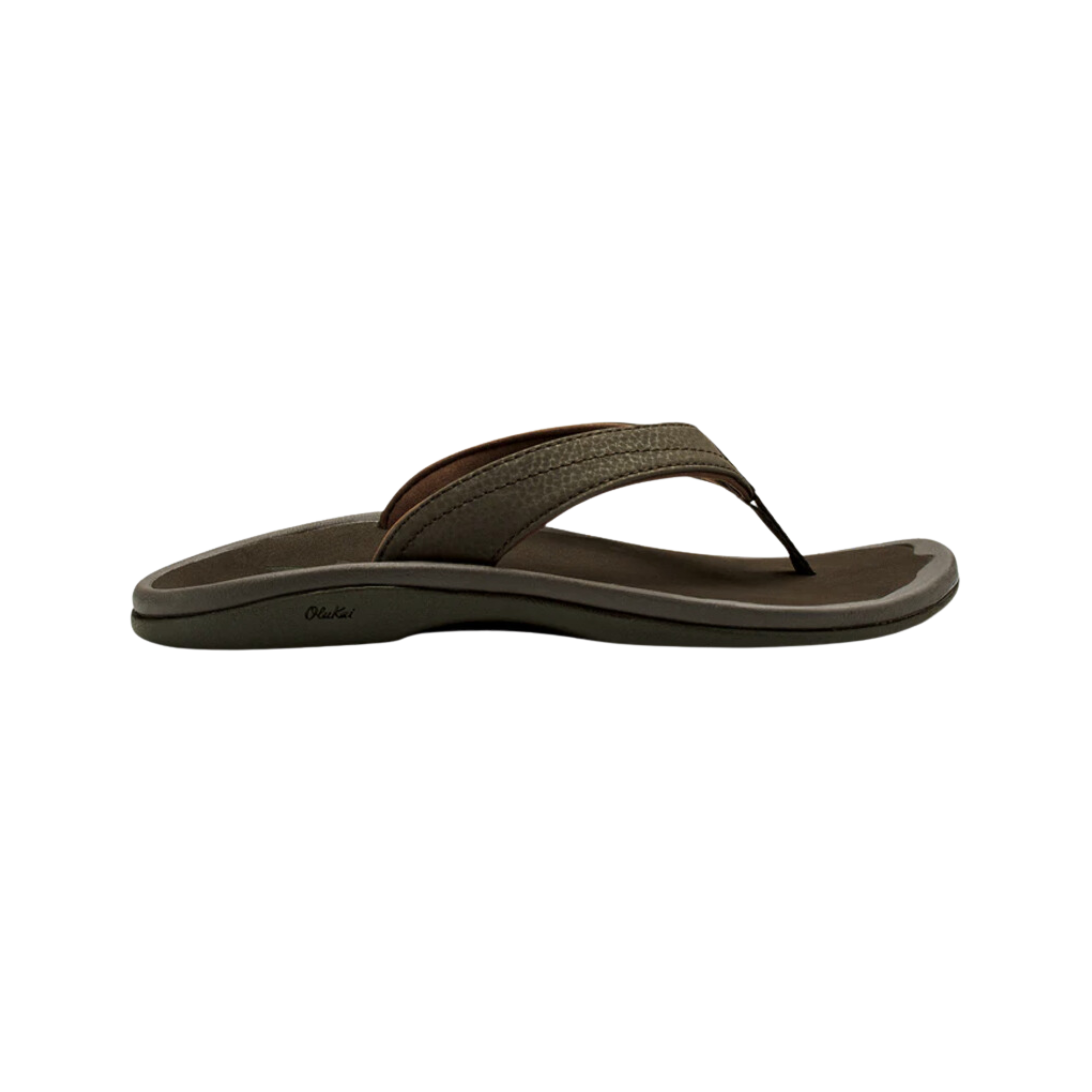 Side view of Women’s Olukai Ohana sandal in dark java – featuring water-resistant synthetic straps, coral reef lug pattern, and non-marking wet-grip rubber for traction on wet surfaces.