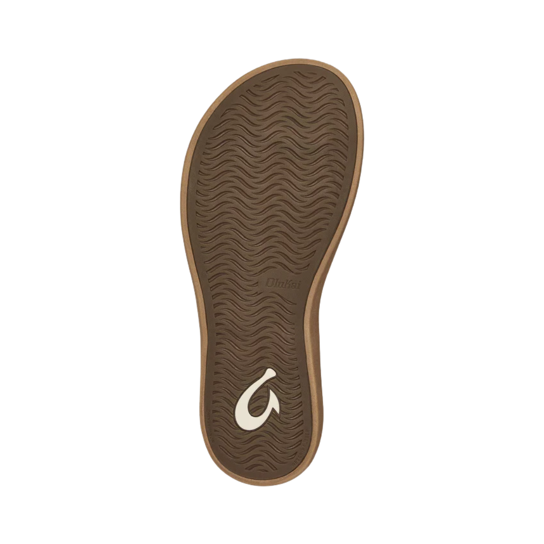 Bottom View of Women’s Olukai Kapehe Luana sandal in bubbly sahara – featuring a non-marking rubber sole, island-inspired tread pattern, and slip-resistant grip for versatile wear.