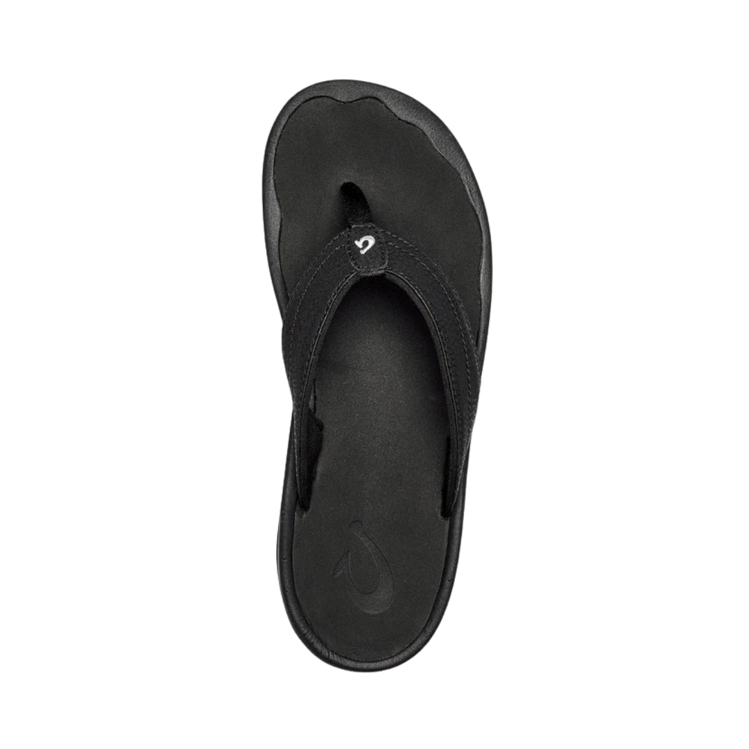 Side View of Women’s Olukai Ohana flip-flop sandal in black – featuring a water-resistant synthetic upper, soft jersey lining for comfort, and a non-marking rubber outsole with enhanced grip.