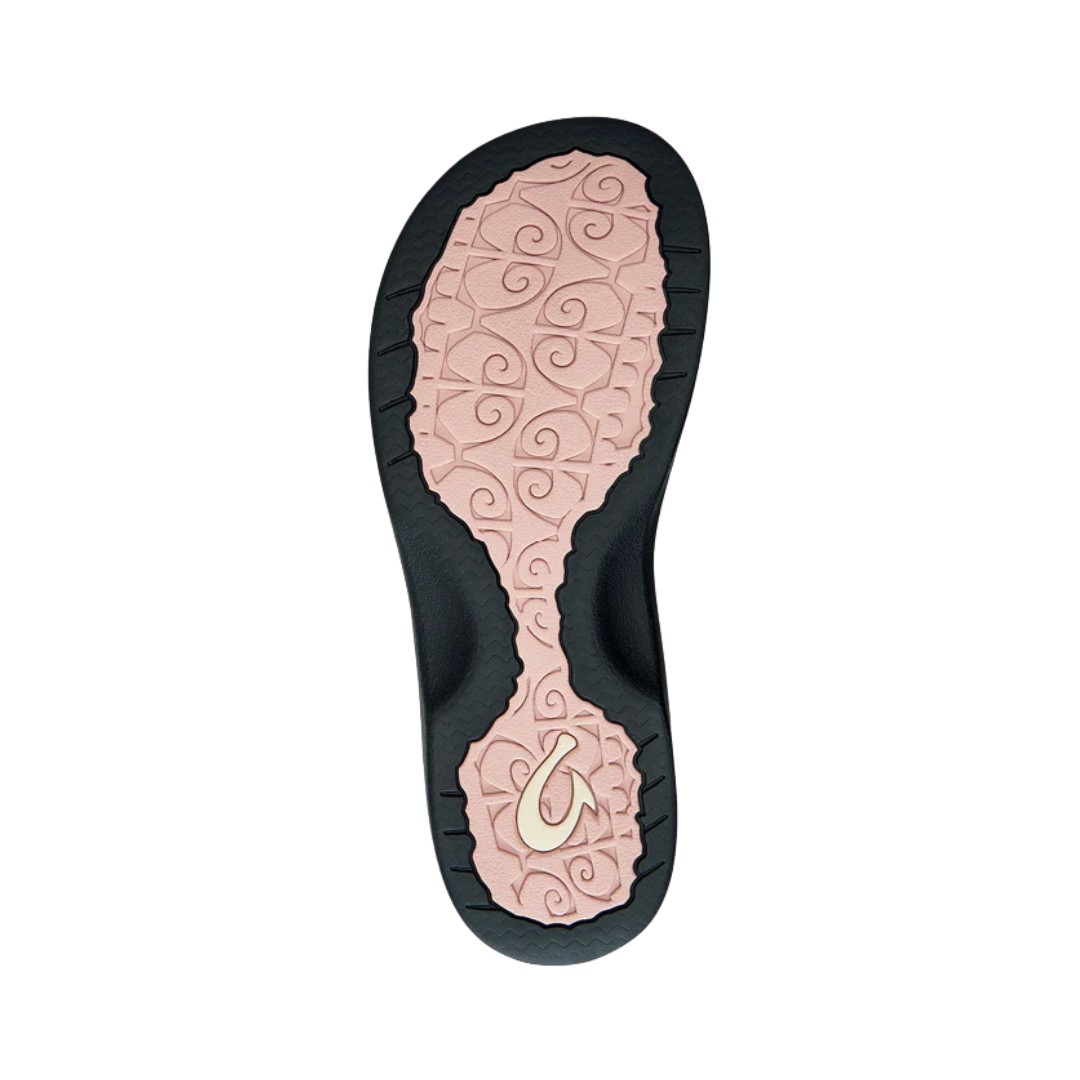 Bottom View of Women’s Olukai Ohana flip-flop sandal in petal pink and black – featuring a durable rubber outsole, coral reef-inspired tread design, and slip-resistant traction for versatile wear.