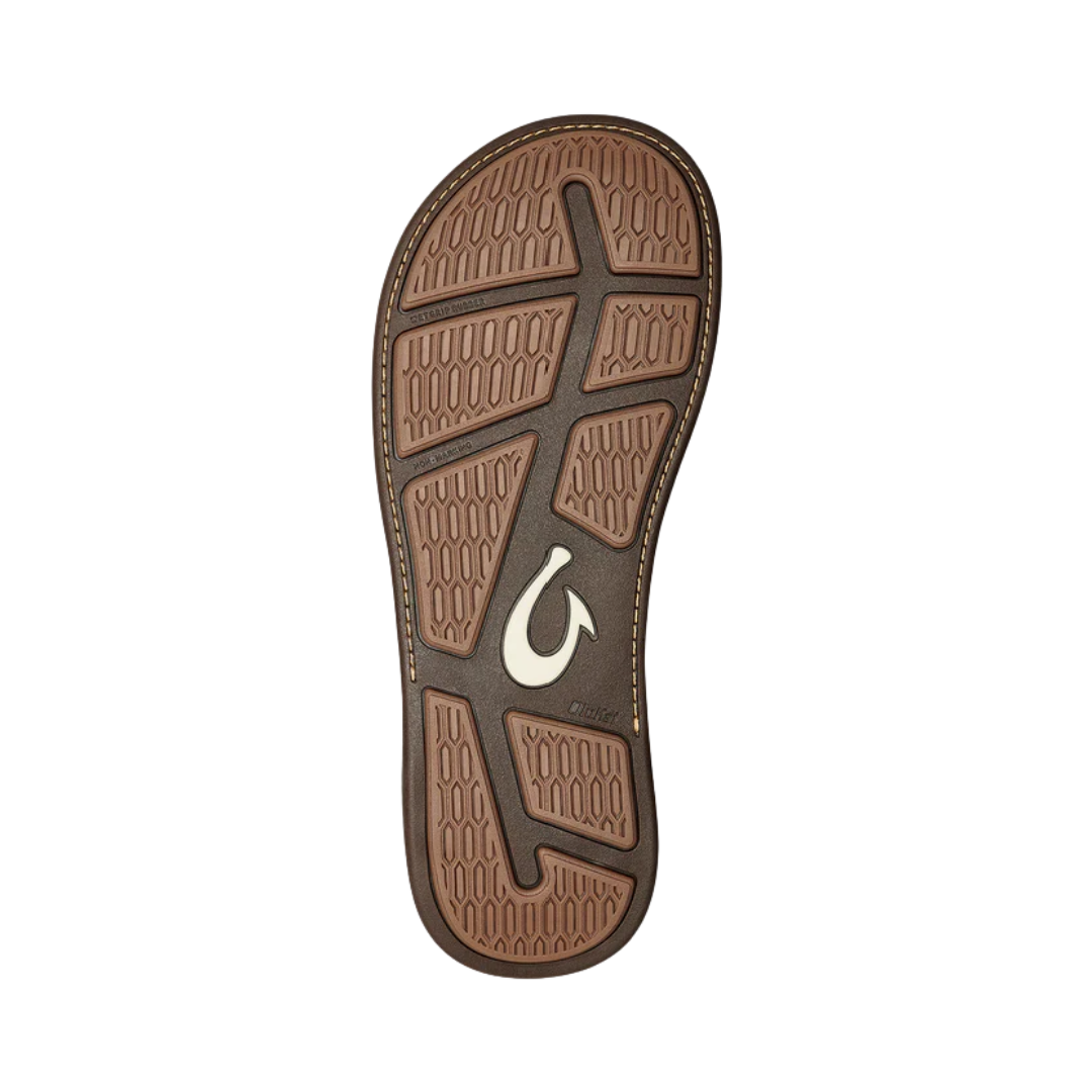 Bottom View of Men’s Olukai Tauhine flip-flop sandal in toffee – featuring a non-marking rubber outsole, ocean-inspired traction pods, and long-lasting durability.