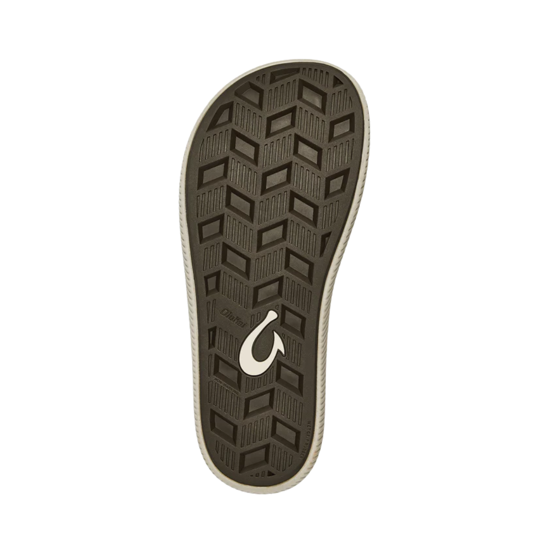 Bottom View of Men’s Olukai Ulele sandal in dark wood – featuring a non-marking wet-grip rubber outsole, enhanced traction pods, and lightweight EVA cushioning for comfort.