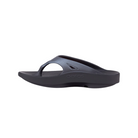 Side view of Women’s OOFOS OOriginal Sport Sandal in graphite – featuring a sporty water-resistant strap, patented OOfoam™ midsole for 37% more impact absorption, contoured footbed with arch support, and lightweight construction for recovery and everyday wear.