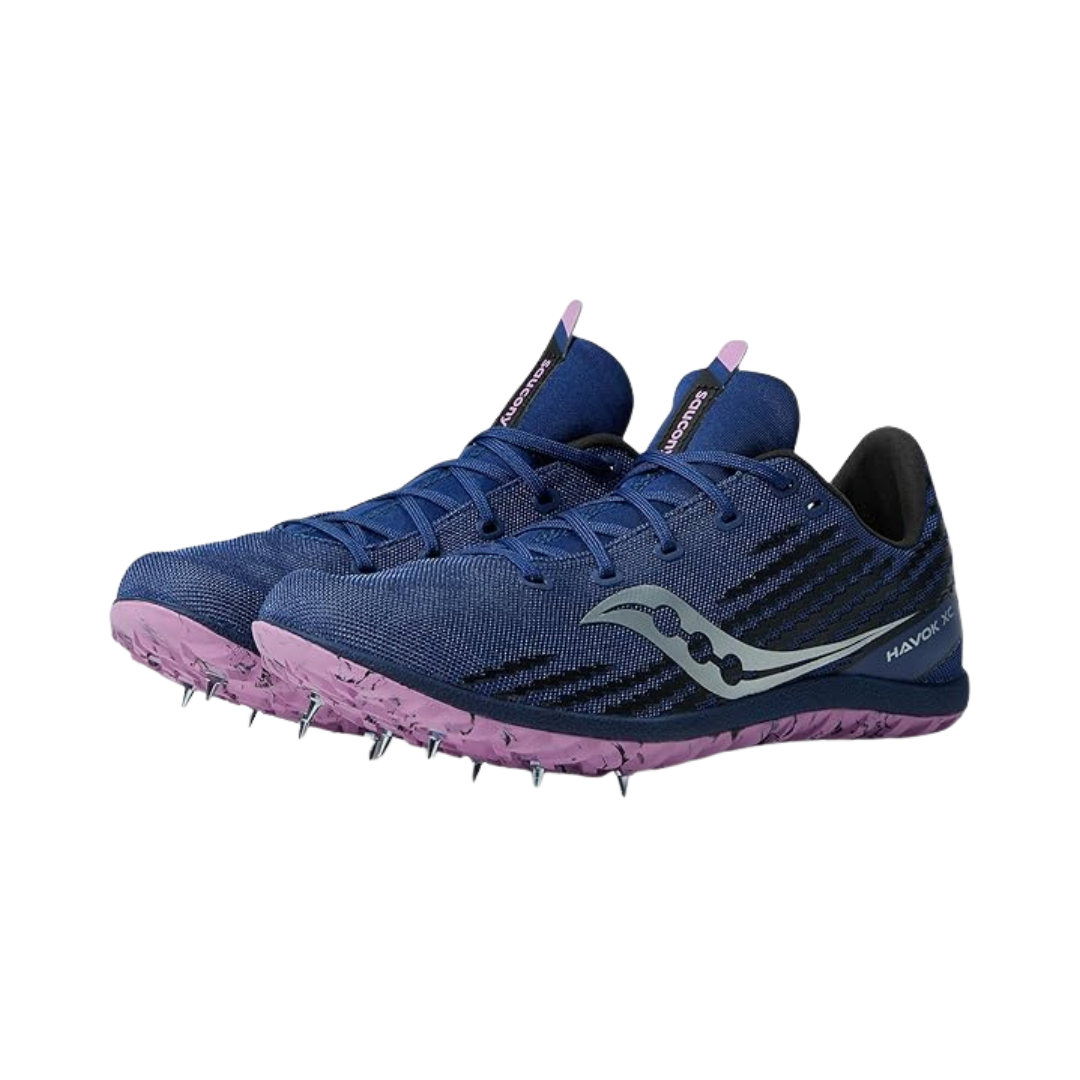 Side view of Women’s Saucony Havok XC3 Spikes in indigo – featuring an ultralight mesh upper, midfoot support cage for stability, 6-pin spike plate, and sleek performance design optimized for cross-country terrain.