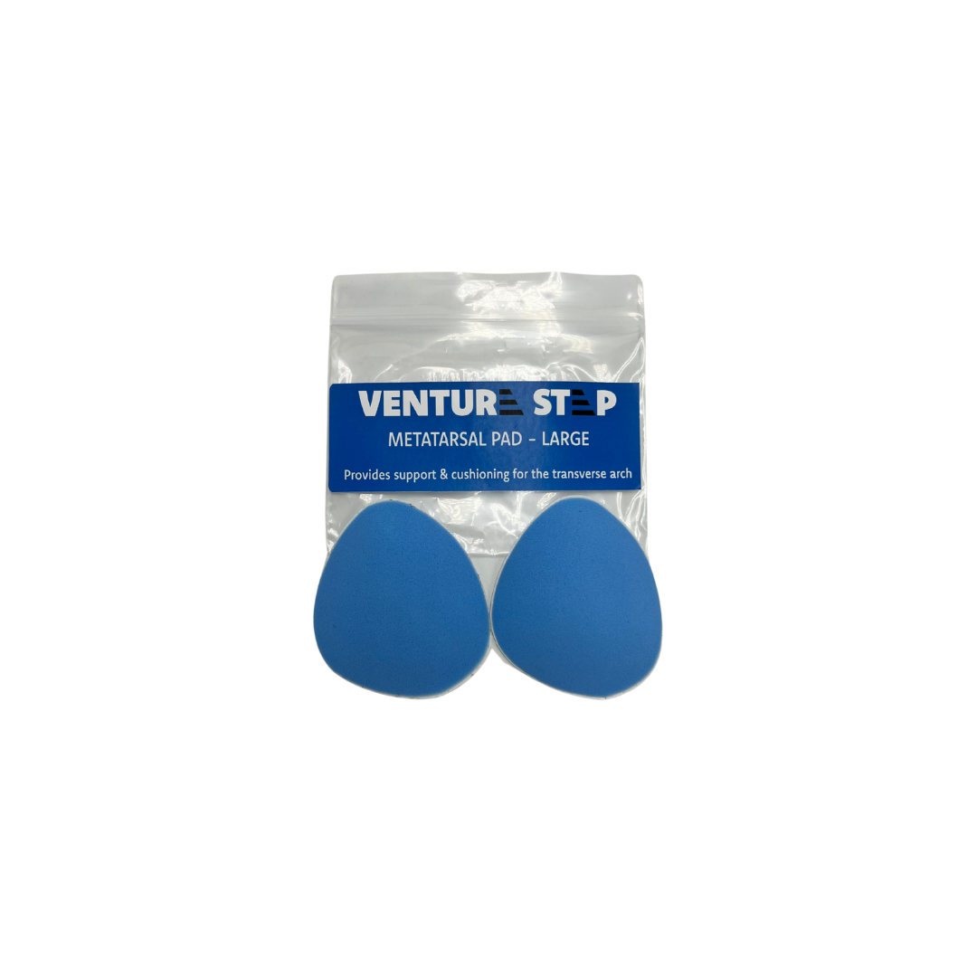 Top view of medium VentureStep Metatarsal Pad – featuring a cushioned design for metatarsal support, ergonomic shape to relieve ball-of-foot pressure, and adhesive backing for secure placement inside the shoe.