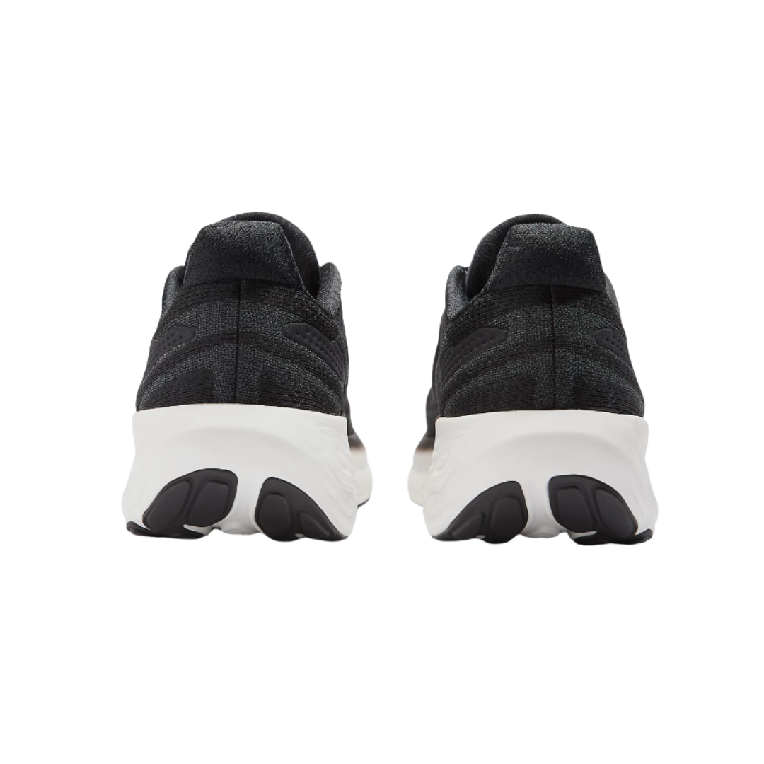 Back View of Women’s New Balance Fresh Foam X 1080v13 running shoe in black with white – featuring structured heel counter for support, pull tab for easy on and off, and padded collar for ankle comfort.